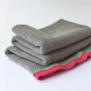 pure cashmere ponch with striped border