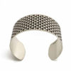 silver cuff with triangle pattern
