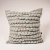 Cassandra Sabo’s handwoven wool, square 'Burrows' cushion from her Forest Collection