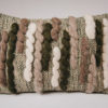 Cassandra Sabo’s handwoven Merino wool rectangular 'Caterpillar' cushion from her Forest Collection