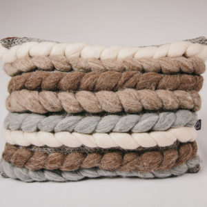 Cassandra Sabo’s handwoven wool, rectangular 'Double Tendril' cushion from her Forest Collection