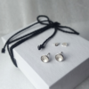 Handcrafted Silver Earrings on the white gift box tied with black cotton string.